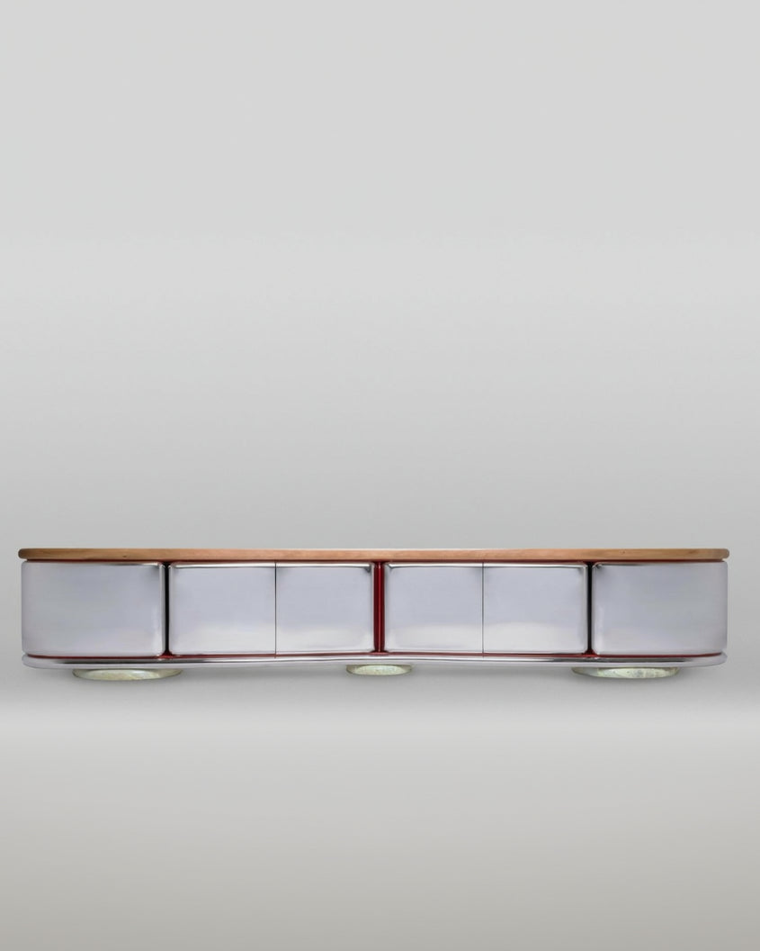 Round electronic device with wooden top on a light gray background