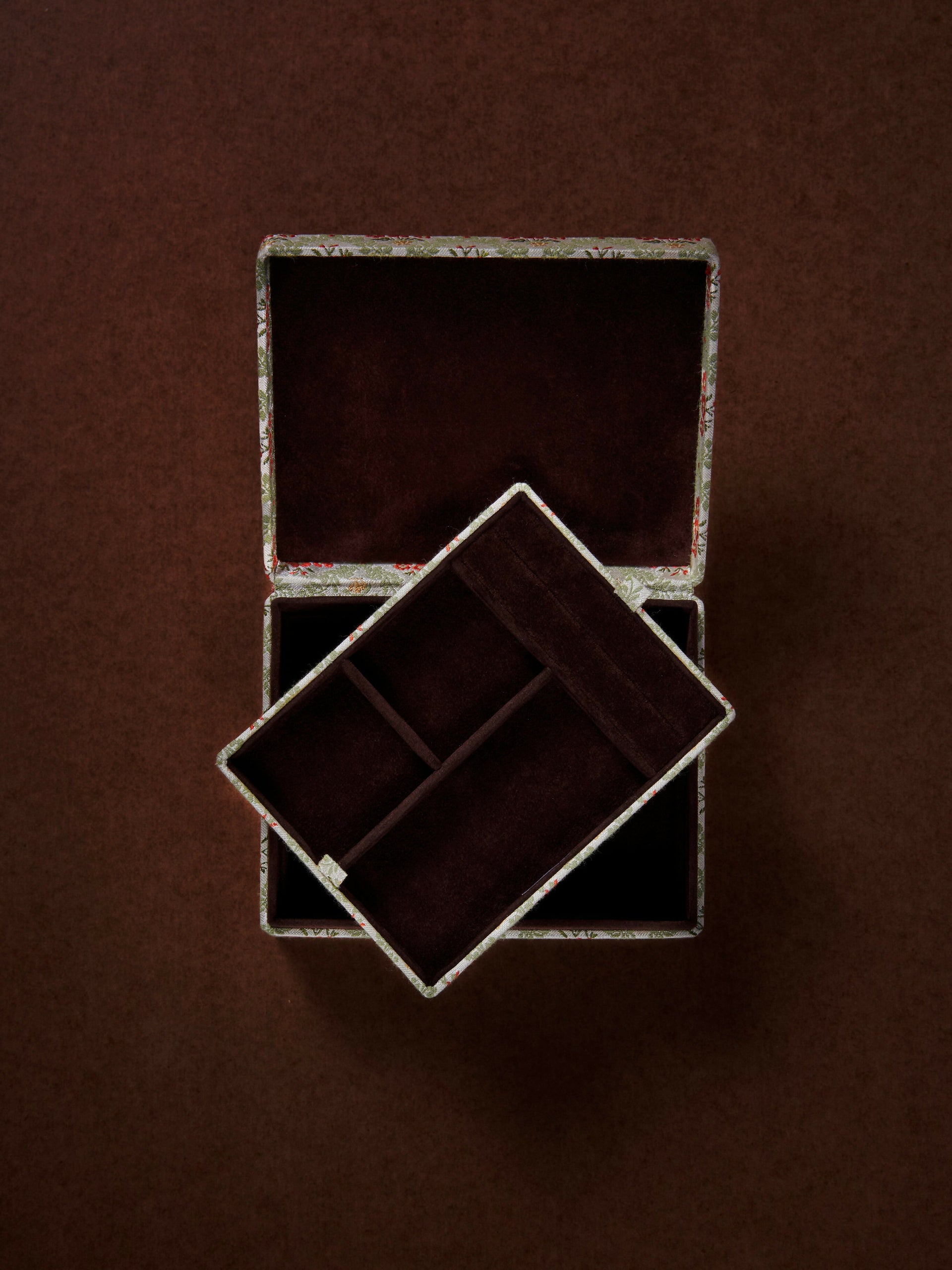 Two dark wooden jewelry boxes on a brown background,  available  to buy on the-salon.com. SALON curates the finest , unique, handmade pieces from the interior industry's best makers and brands. Shop luxury furniture, lighting, rugs, art, antiques and vintage pieces and accessories from SALON interior designed rooms.