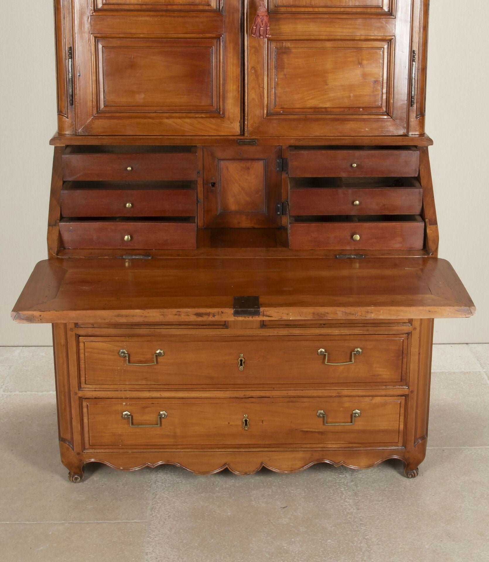 Wooden desk with multiple drawers and a large central compartment,  available  to buy on the-salon.com. SALON curates the finest , unique, handmade pieces from the interior industry's best makers and brands. Shop luxury furniture, lighting, rugs, art, antiques and vintage pieces and accessories from SALON interior designed rooms.