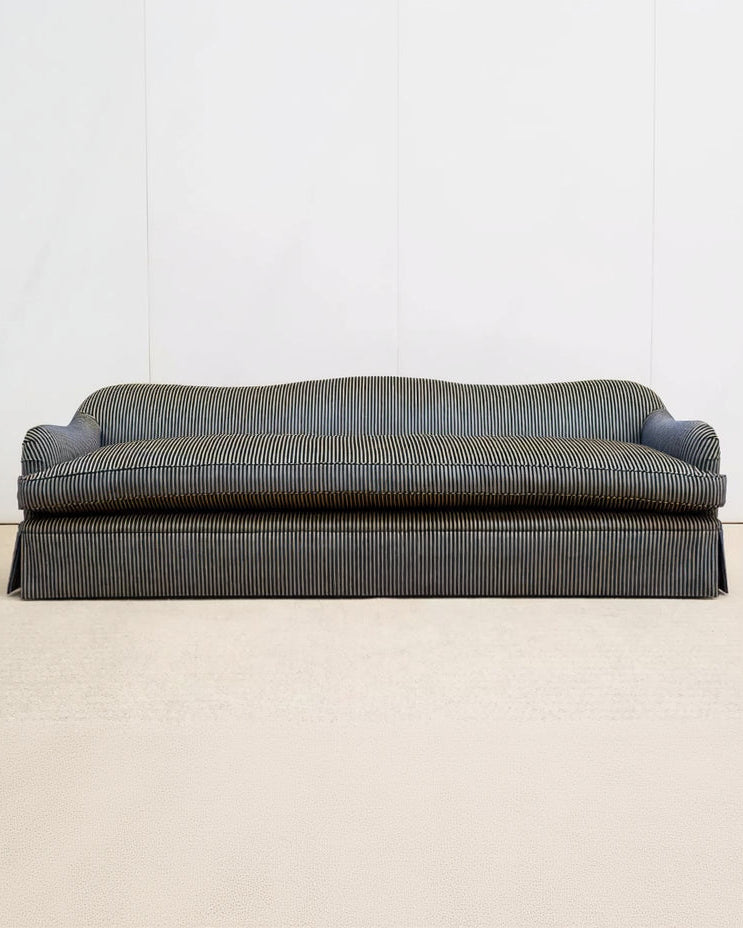 Striped sofa on a plain background