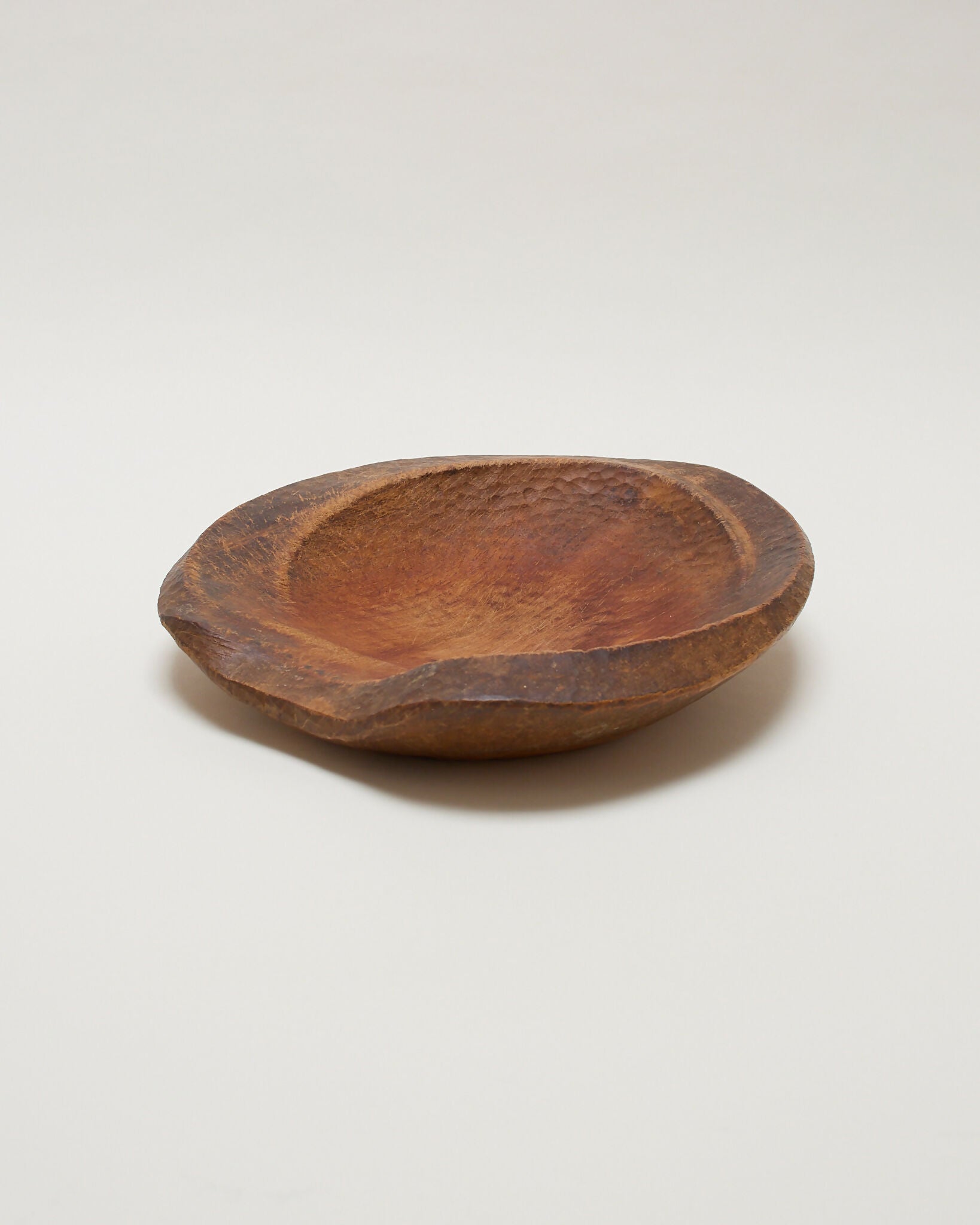 Wooden bowl on a plain background,  available  to buy on the-salon.com. SALON curates the finest , unique, handmade pieces from the interior industry's best makers and brands. Shop luxury furniture, lighting, rugs, art, antiques and vintage pieces and accessories from SALON interior designed rooms.