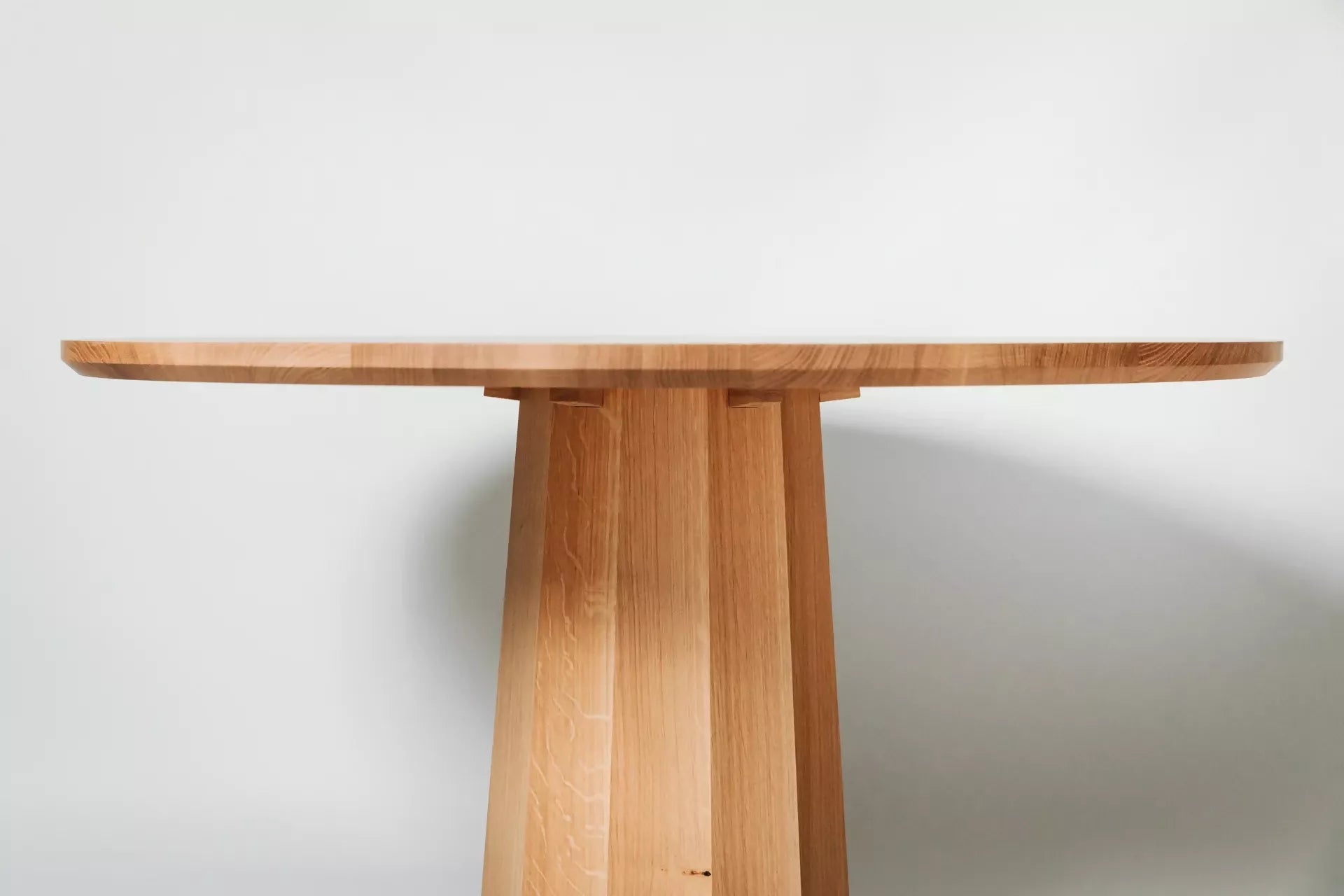 POLYGON PEDESTAL DINING TABLE BY GALVIN BROTHERS