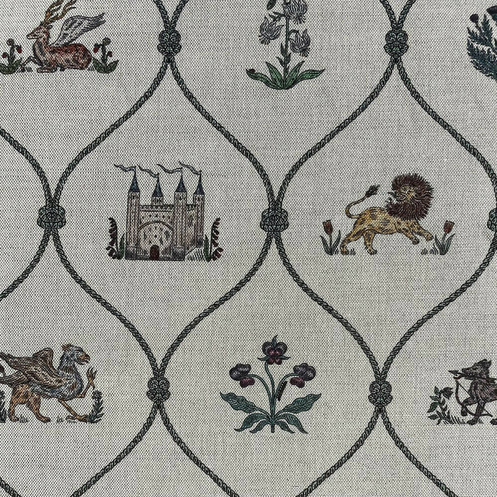 A piece of fabric with heraldic designs including a castle, a lion, and other traditional motifs, printed in a repeating pattern, available  to buy on the-salon.com. SALON curates the finest , unique, handmade pieces from the interior industry's best makers and brands. Shop luxury furniture, lighting, rugs, art, antiques and vintage pieces and accessories from SALON interior designed rooms.