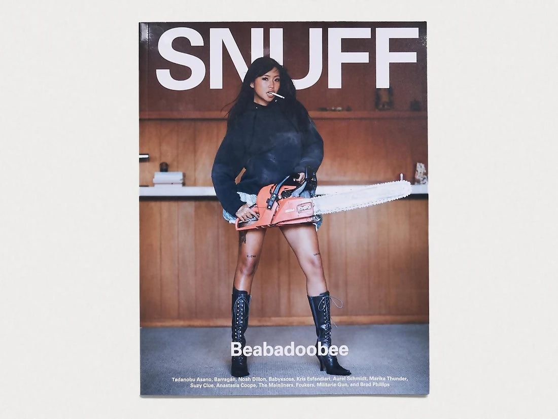 Cover of SNUFF MAGAZINE Issue 5 featuring a Beabadoobee in casual clothing, predominantly in a indoors setting with wooden panel walls,  available  to buy on the-salon.com. SALON curates the finest , unique, handmade pieces from the interior industry's best makers and brands. Shop luxury furniture, lighting, rugs, art, antiques and vintage pieces and accessories from SALON interior designed rooms.