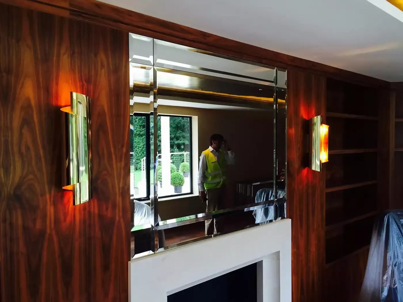 THE CURVE WALL SCONCES IN ANTIQUE BRASS BY ANDREW KORNAT