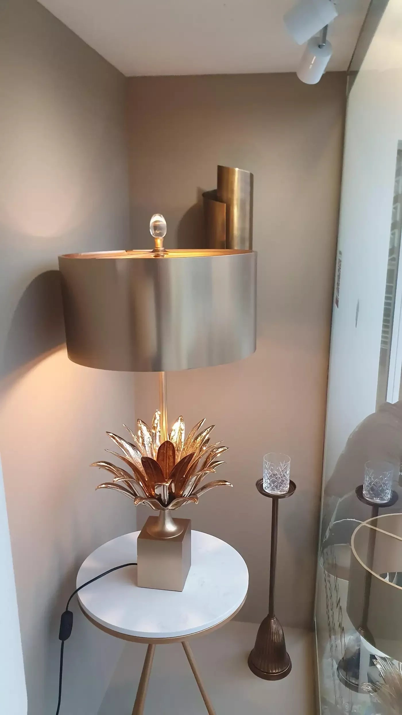 THE CURVE WALL SCONCES IN BLACK BRASS BY ANDREW KORNAT