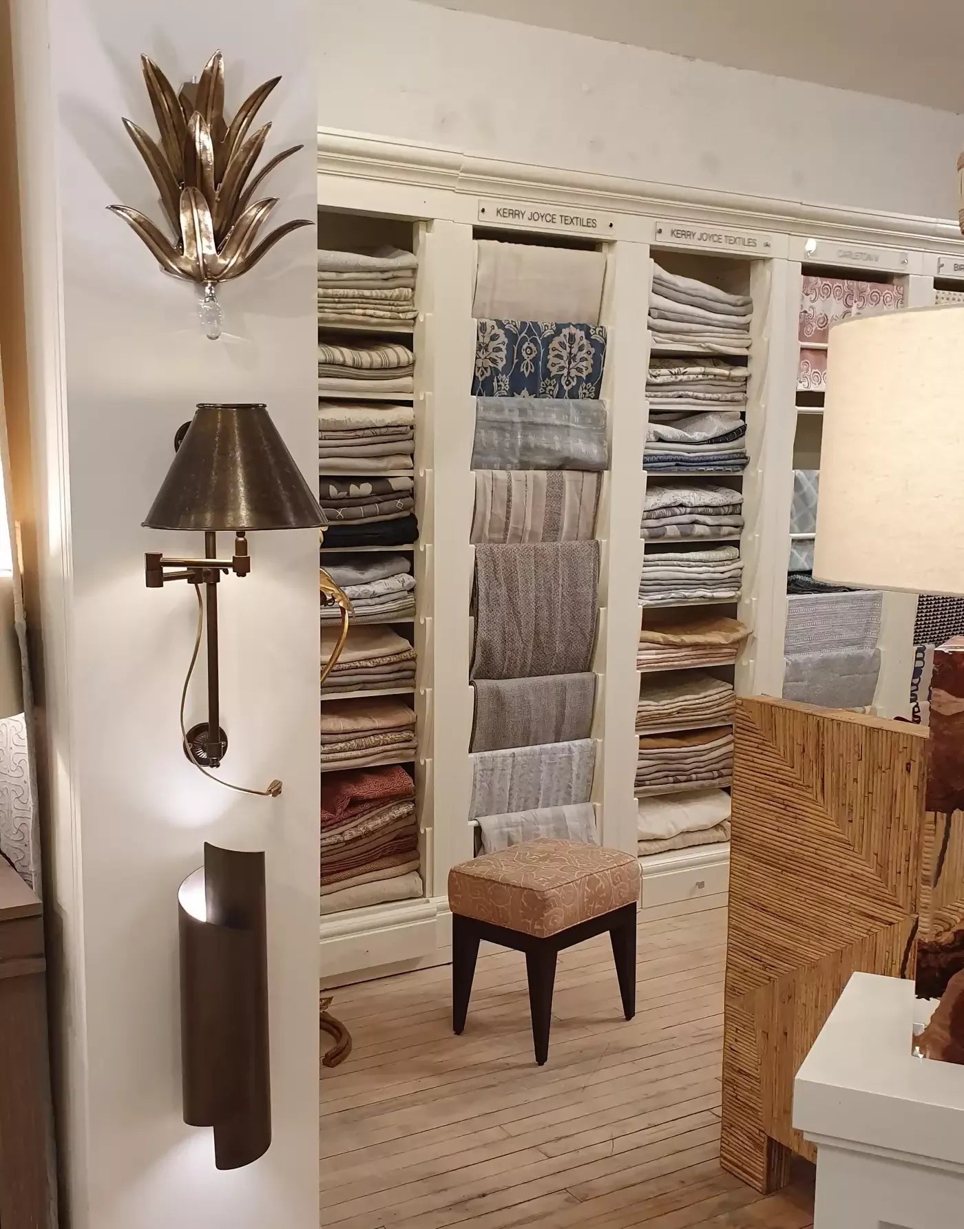 THE CURVE WALL SCONCES IN BLACK BRASS BY ANDREW KORNAT