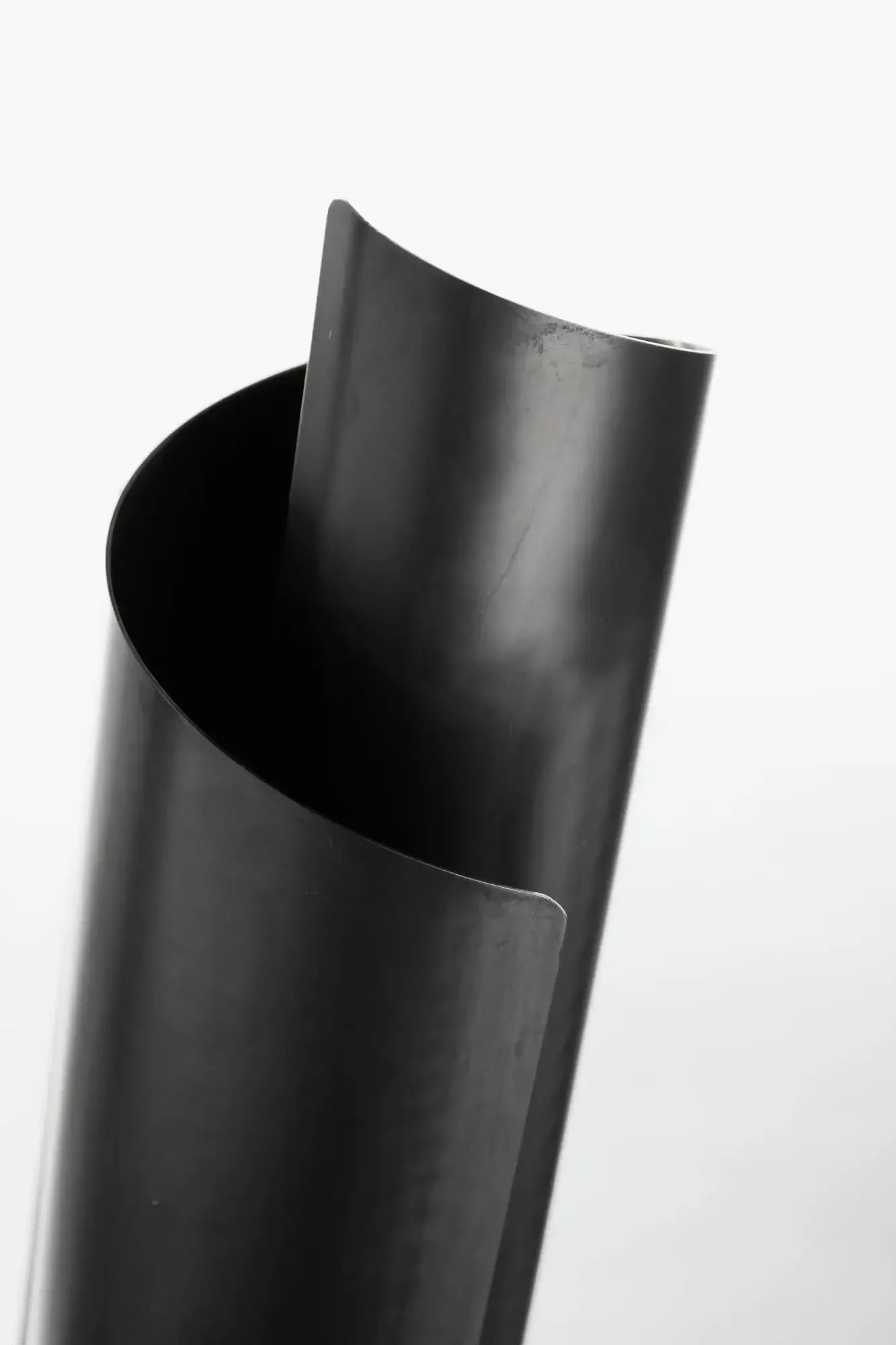 THE CURVE WALL SCONCES IN BLACK BRASS BY ANDREW KORNAT