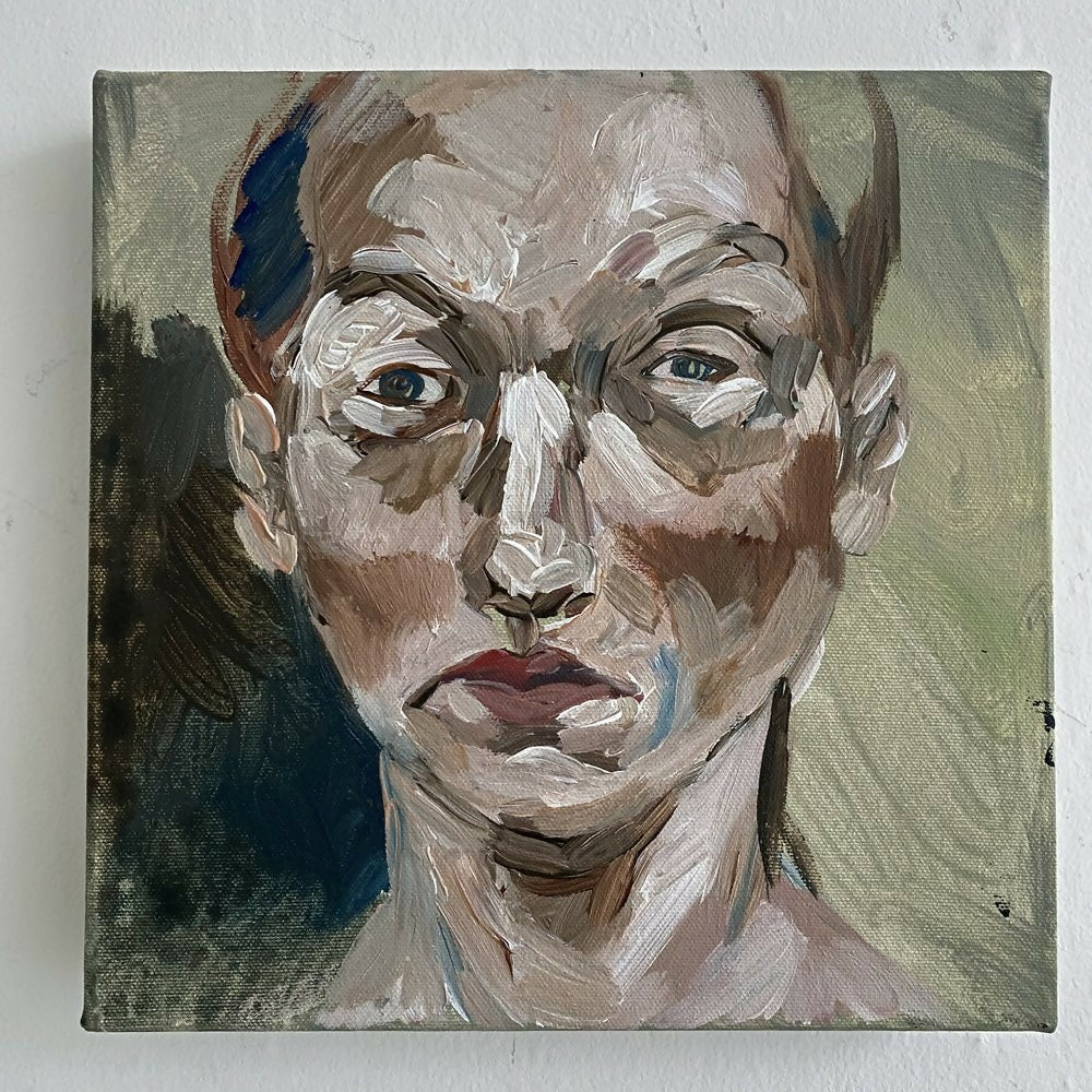 Painting of a face with a neutral expression on a textured surface, available  to buy on the-salon.com. SALON curates the finest , unique, handmade pieces from the interior industry's best makers and brands. Shop luxury furniture, lighting, rugs, art, antiques and vintage pieces and accessories from SALON interior designed rooms.