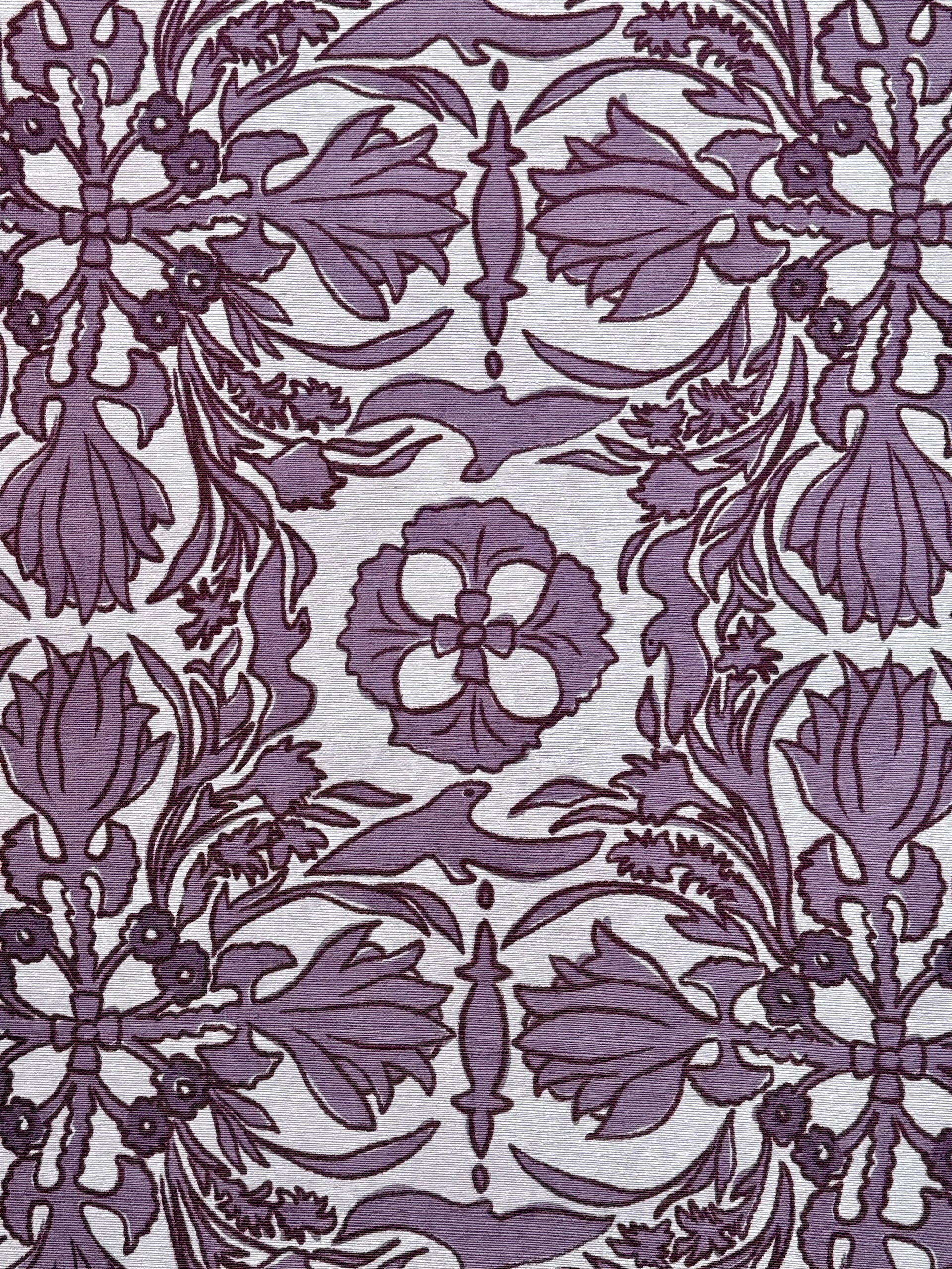 A section of wallpaper with a floral pattern in shades of purple, featuring a decorative design, available  to buy on the-salon.com. SALON curates the finest , unique, handmade pieces from the interior industry's best makers and brands. Shop luxury furniture, lighting, rugs, art, antiques and vintage pieces and accessories from SALON interior designed rooms.