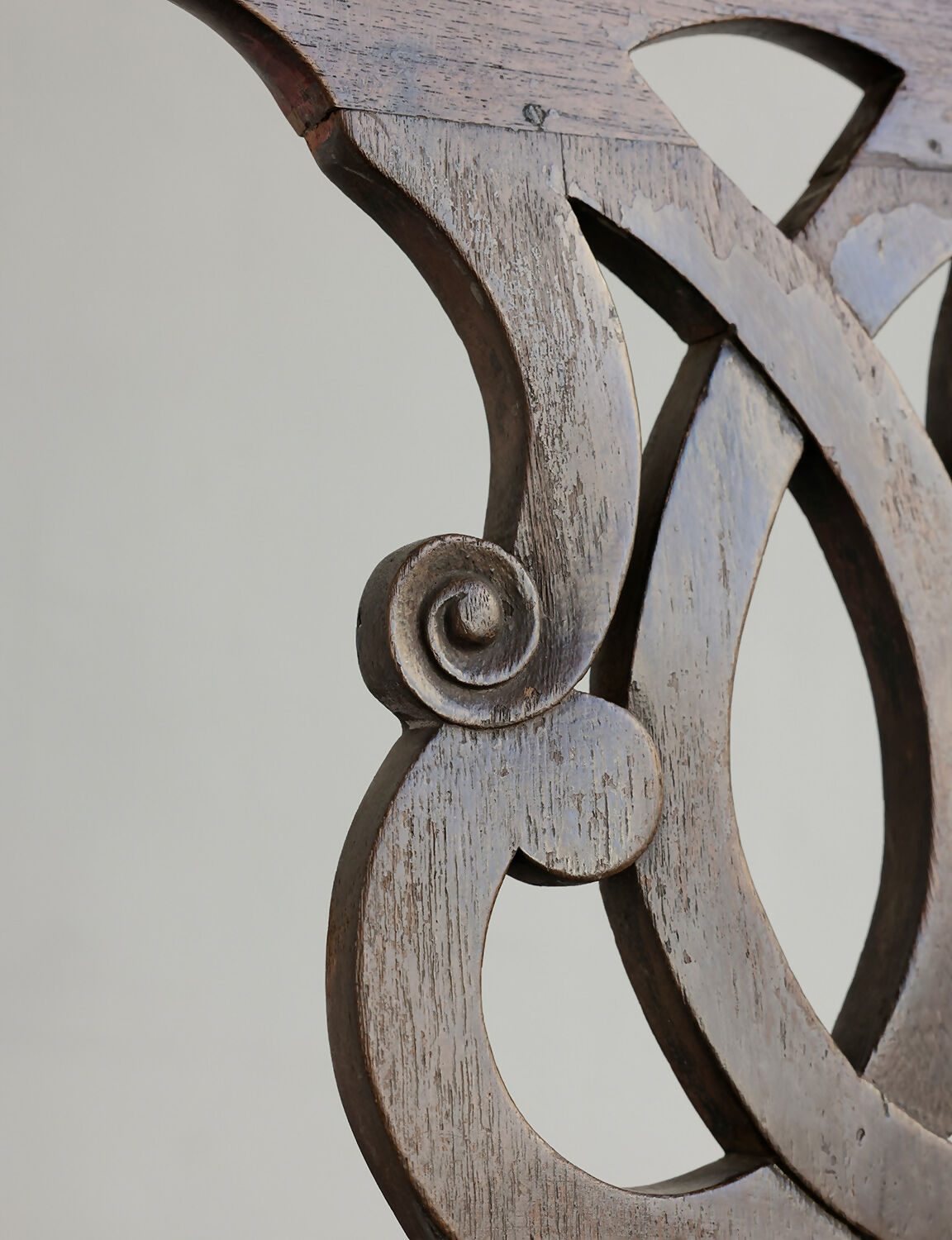 Close-up of decorative wooden backing with intricate design on a light background,available to buy from the-salon.com. SALON curates the finest unique handmade pieces from the interior industry's best makers and brands. Shop luxury furniture, lighting, rugs, art, antiques and vintage pieces and accessories from SALON interior designed rooms. 