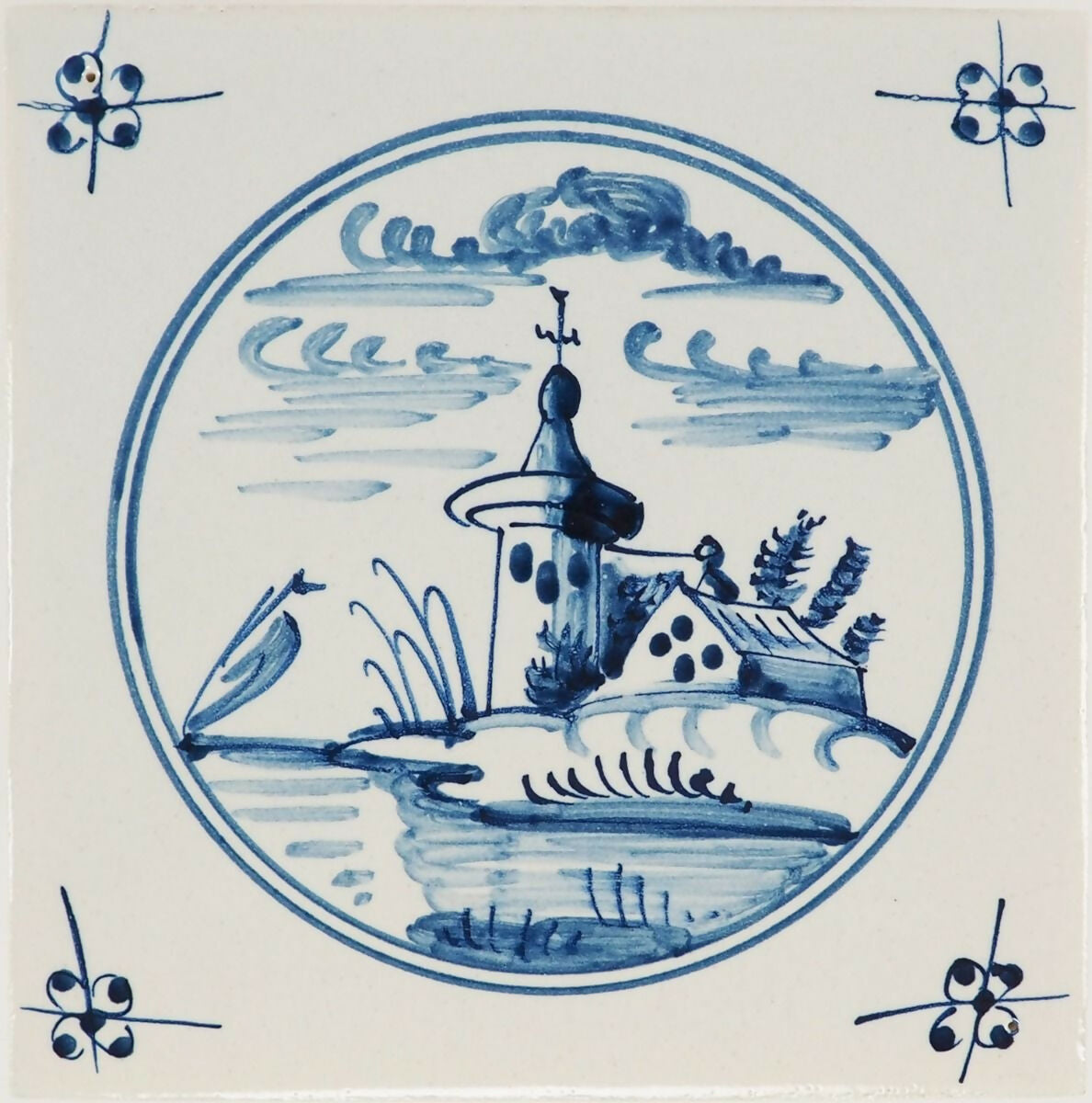 Decorative tile with blue and white design of a lighthouse and landscape,  available  to buy on the-salon.com. SALON curates the finest , unique, handmade pieces from the interior industry's best makers and brands. Shop luxury furniture, lighting, rugs, art, antiques and vintage pieces and accessories from SALON interior designed rooms.