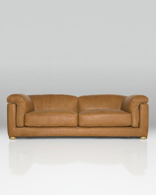 Brown leather sofa on a white background