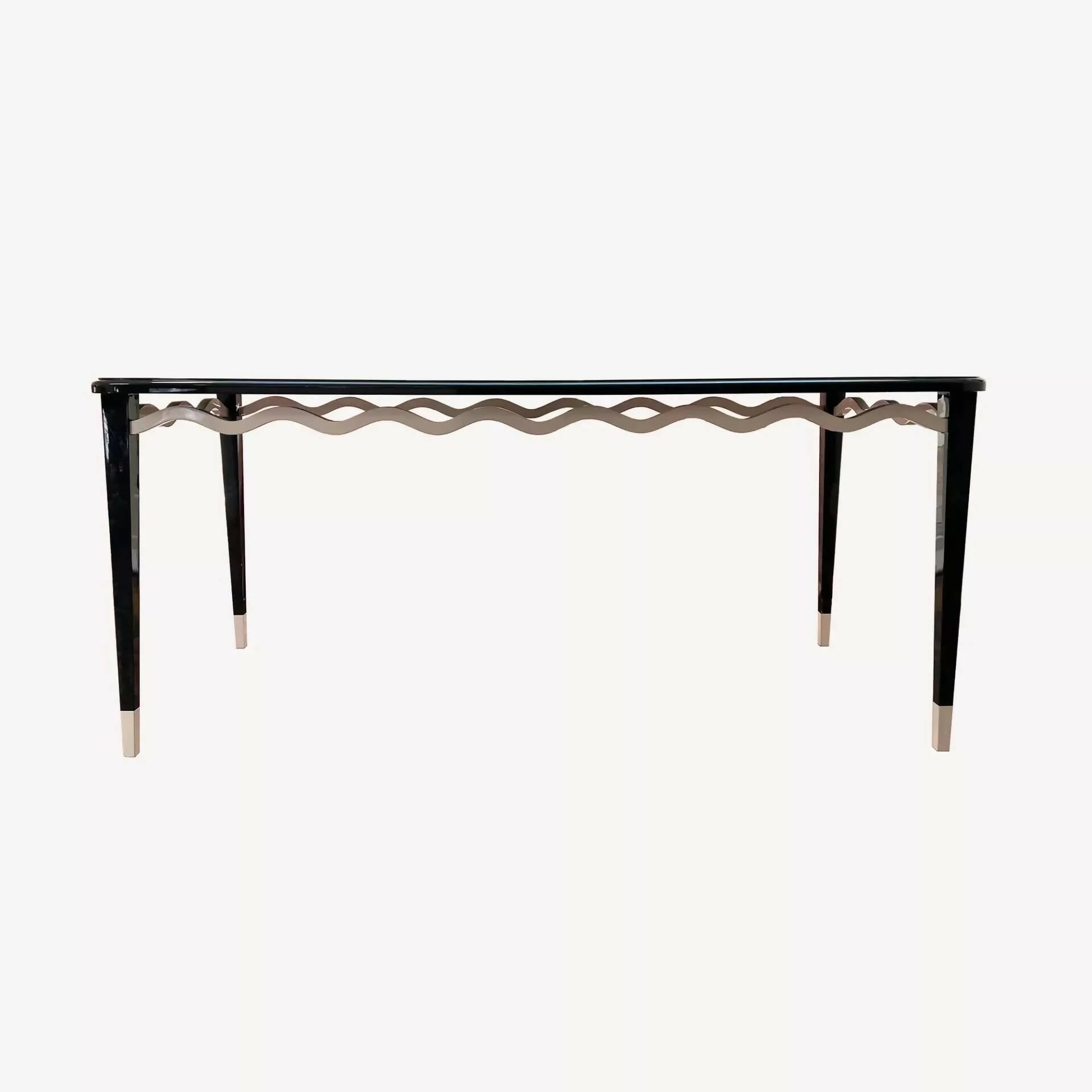 THE SERPENTINE TABLE BY STUDIO HOLLOND
