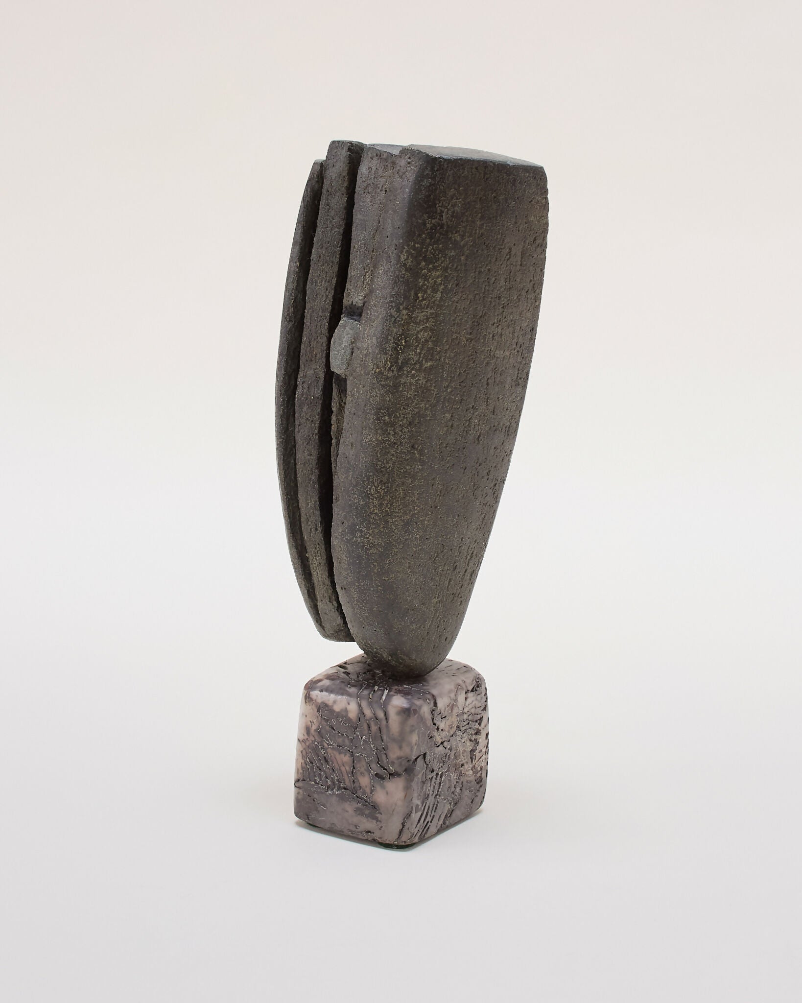 Abstract ceramic sculpture on a white background,  available  to buy on the-salon.com. SALON curates the finest , unique, handmade pieces from the interior industry's best makers and brands. Shop luxury furniture, lighting, rugs, art, antiques and vintage pieces and accessories from SALON interior designed rooms.