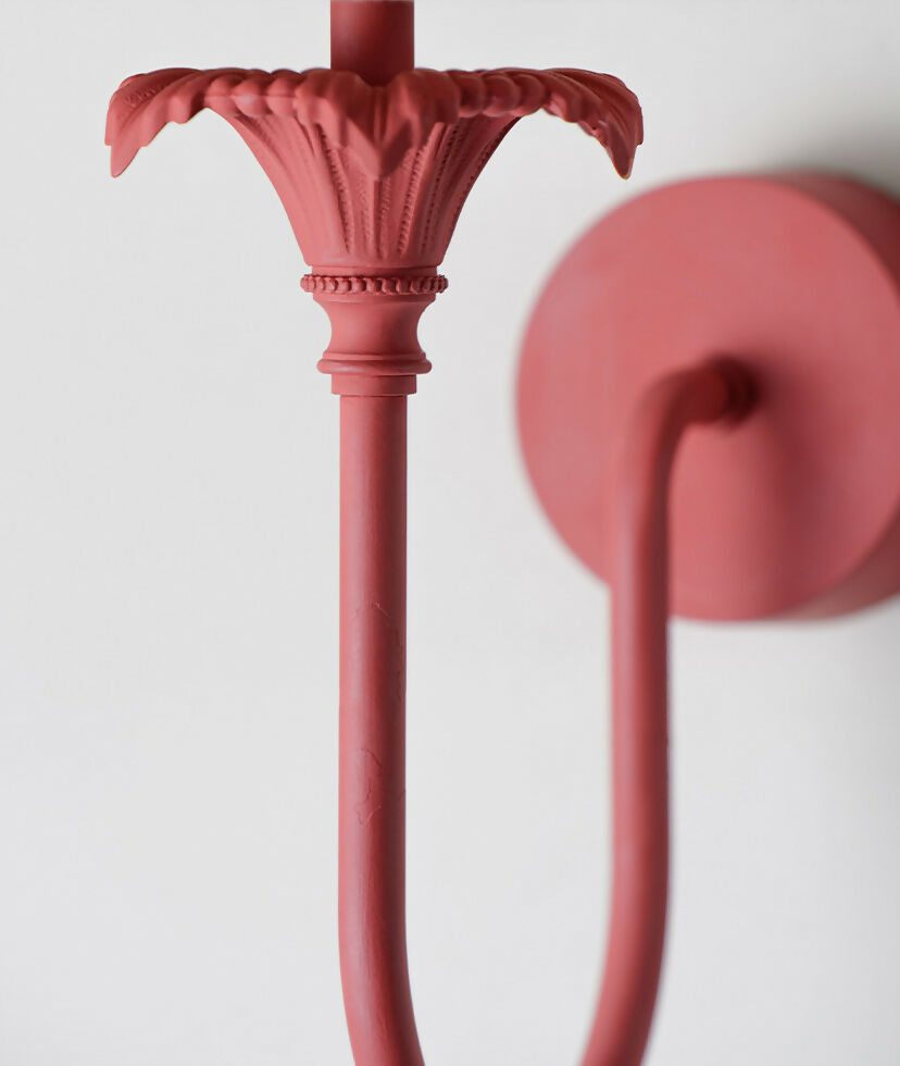 Decorative pink wall sconce with intricate design on a white background,  available  to buy on the-salon.com. SALON curates the finest , unique, handmade pieces from the interior industry's best makers and brands. Shop luxury furniture, lighting, rugs, art, antiques and vintage pieces and accessories from SALON interior designed rooms.