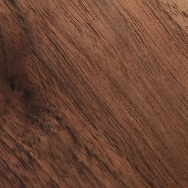 A view of the walnut wood, with the wood grains still visible,  available  to buy on the-salon.com. SALON curates the finest , unique, handmade pieces from the interior industry's best makers and brands. Shop luxury furniture, lighting, rugs, art, antiques and vintage pieces and accessories from SALON interior designed rooms.