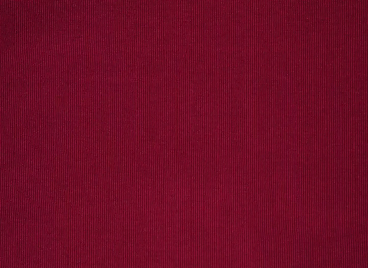 A view of a red fabric with a textured weave pattern suitable for upholstery,  available  to buy on the-salon.com. SALON curates the finest , unique, handmade pieces from the interior industry's best makers and brands. Shop luxury furniture, lighting, rugs, art, antiques and vintage pieces and accessories from SALON interior designed rooms.
