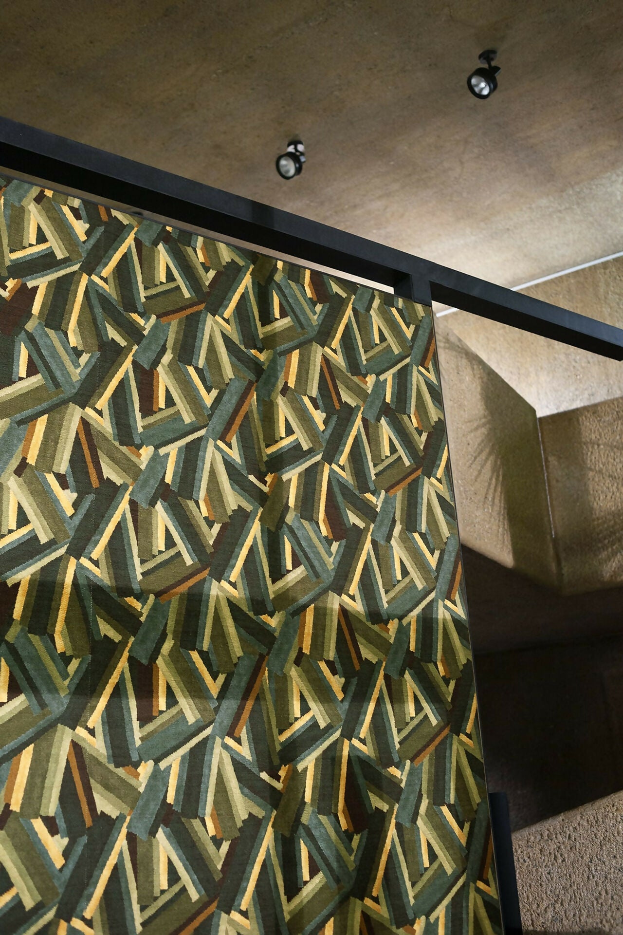 Geometric patterned wall with a textured finish in a room setting,Shop XXX by xxxx shown in SALON designed rooms. SALON curates the finest unique handmade pieces from the interior industry's best makers and brands. Shop luxury furniture, lighting, rugs, art, antiques and vintage pieces and accessories from SALON interior designed rooms. 
