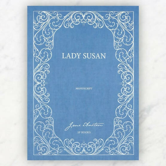 Cover of the book 'LADY SUSAN' featuring ornate white text on a blue background, indicative of classic literature,  available  to buy on the-salon.com. SALON curates the finest , unique, handmade pieces from the interior industry's best makers and brands. Shop luxury furniture, lighting, rugs, art, antiques and vintage pieces and accessories from SALON interior designed rooms.