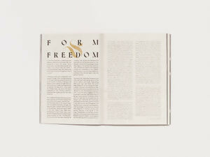 Open book with text on a white background,  available  to buy on the-salon.com. SALON curates the finest , unique, handmade pieces from the interior industry's best makers and brands. Shop luxury furniture, lighting, rugs, art, antiques and vintage pieces and accessories from SALON interior designed rooms.