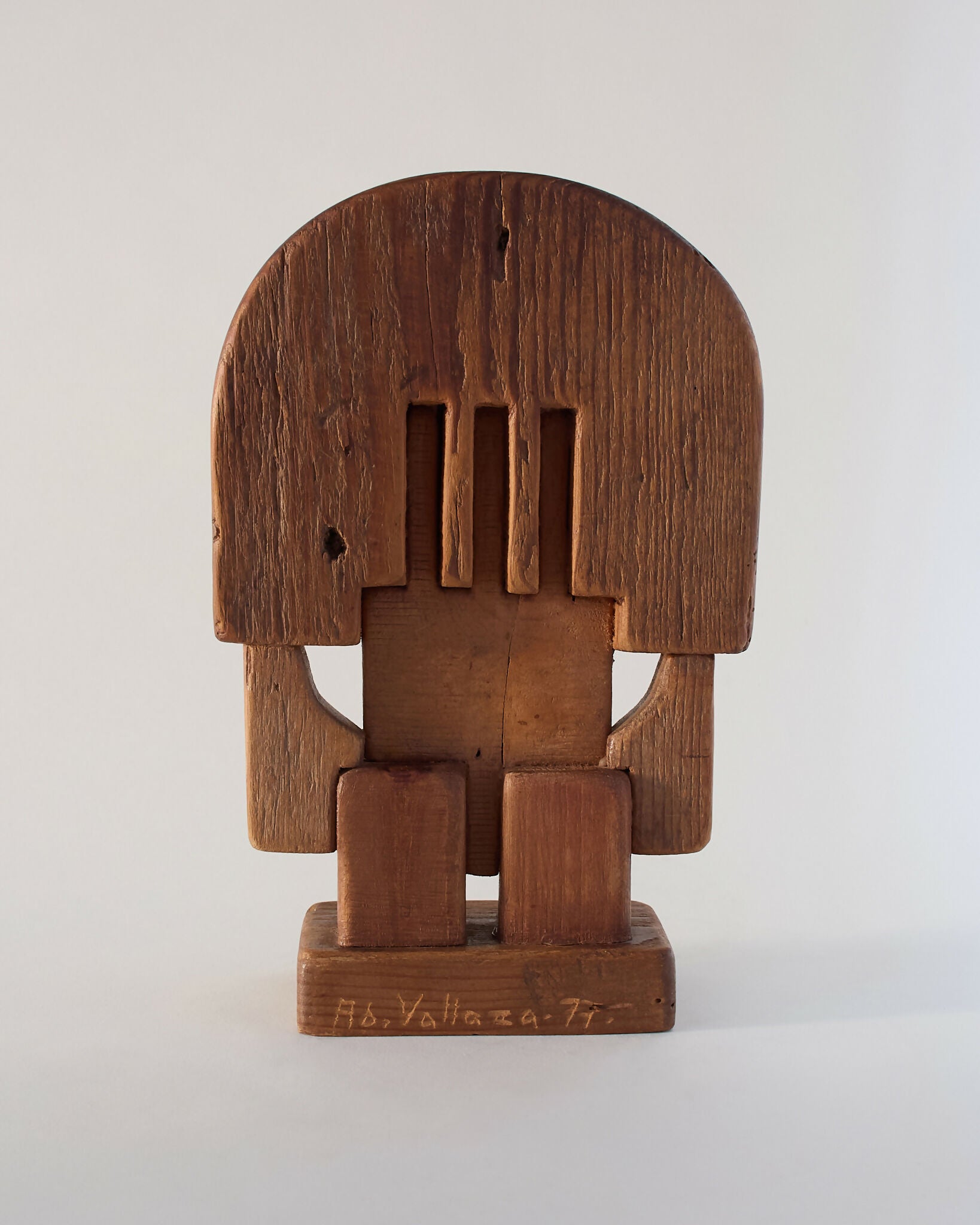 A hand-carved wooden sculpture by Adolf Vallazza, featuring an abstract figure with interlocking forms, with a dark brown to black color, available  to buy on the-salon.com. SALON curates the finest , unique, handmade pieces from the interior industry's best makers and brands. Shop luxury furniture, lighting, rugs, art, antiques and vintage pieces and accessories from SALON interior designed rooms.