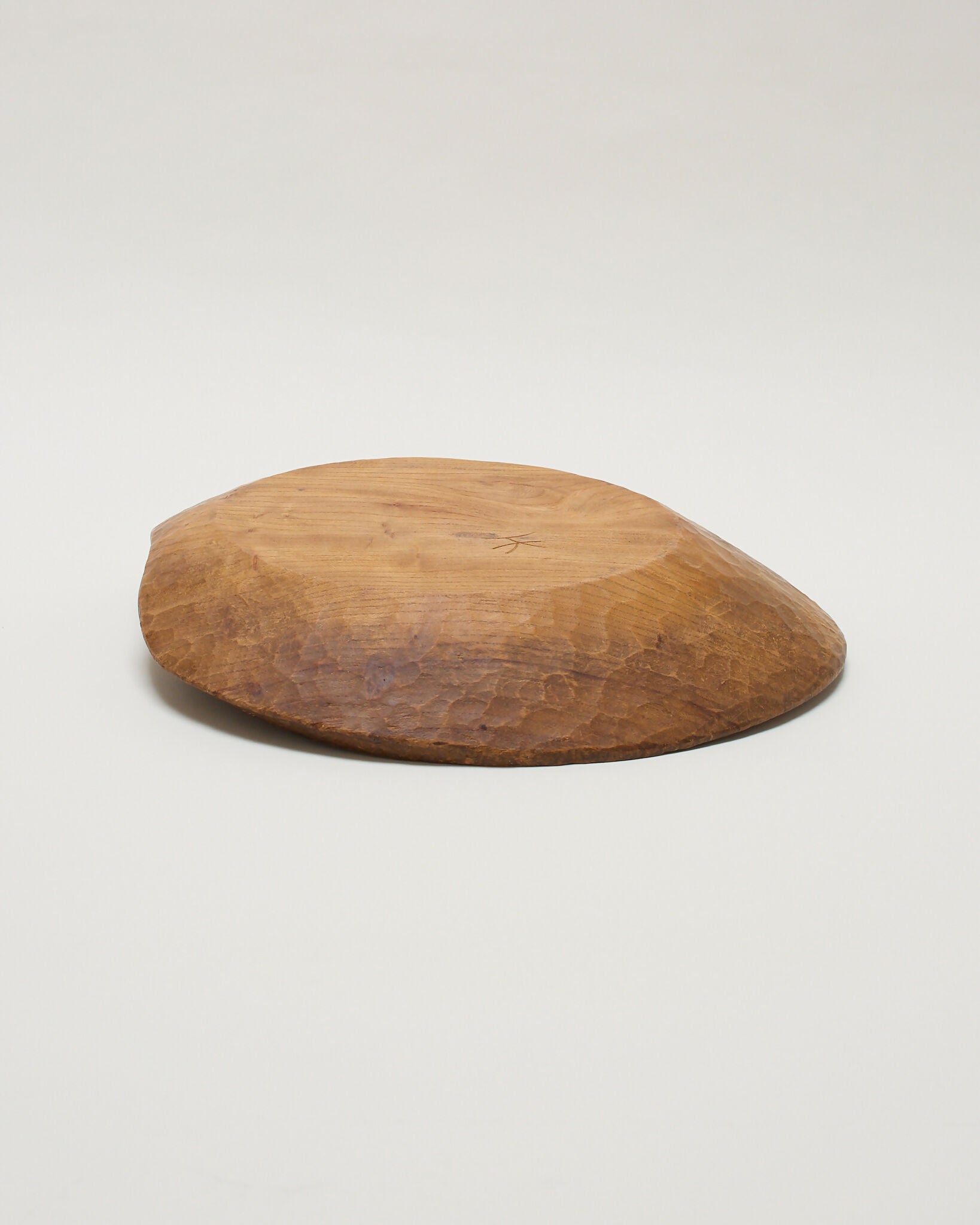 Wooden bowl upside down ,on a white background,  available  to buy on the-salon.com. SALON curates the finest , unique, handmade pieces from the interior industry's best makers and brands. Shop luxury furniture, lighting, rugs, art, antiques and vintage pieces and accessories from SALON interior designed rooms.