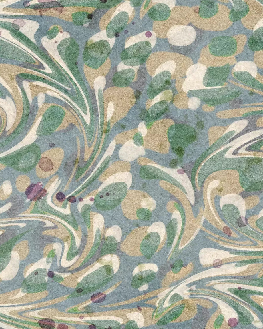Wallpaper swatch with intricate floral pattern on a blue background