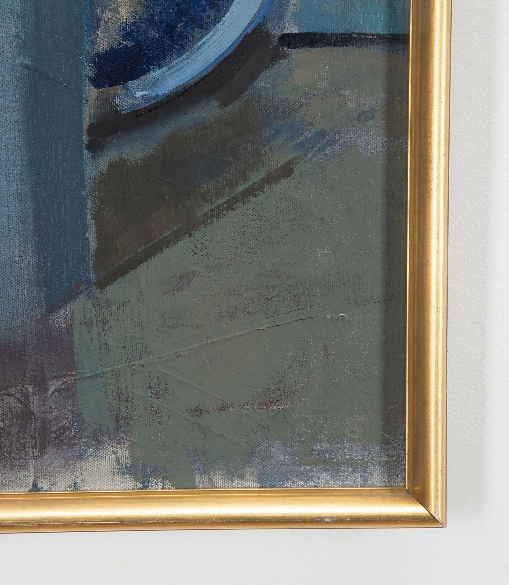 Abstract painting with gold frame on a white wall with a closeup on the gold ornate frame,  available  to buy on the-salon.com. SALON curates the finest , unique, handmade pieces from the interior industry's best makers and brands. Shop luxury furniture, lighting, rugs, art, antiques and vintage pieces and accessories from SALON interior designed rooms.