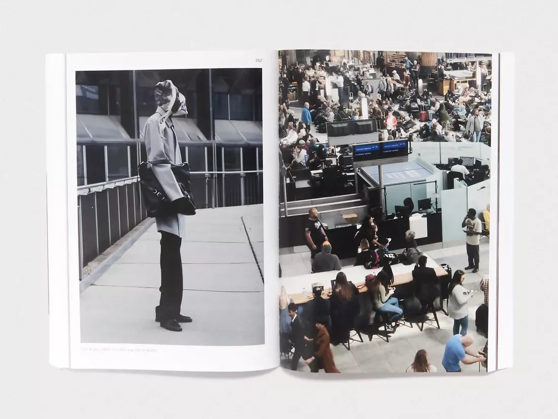 An image of an open book, the pages containing two images, one being a person in public , stood looking to the side wearing ambiguous clothing and the other being a place that is full of ordinary people,  available  to buy on the-salon.com. SALON curates the finest , unique, handmade pieces from the interior industry's best makers and brands. Shop luxury furniture, lighting, rugs, art, antiques and vintage pieces and accessories from SALON interior designed rooms.