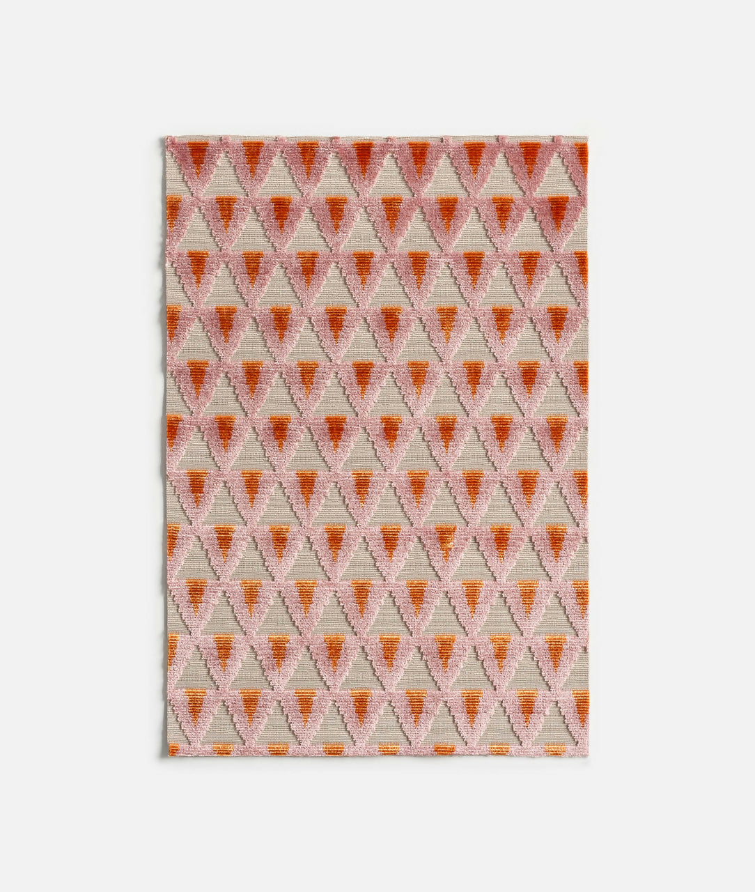 A geometric patterned jacquard velvet fabric in orange and white tones on a ottoman ground,available  to buy on the-salon.com. SALON curates the finest , unique, handmade pieces from the interior industry's best makers and brands. Shop luxury furniture, lighting, rugs, art, antiques and vintage pieces and accessories from SALON interior designed rooms