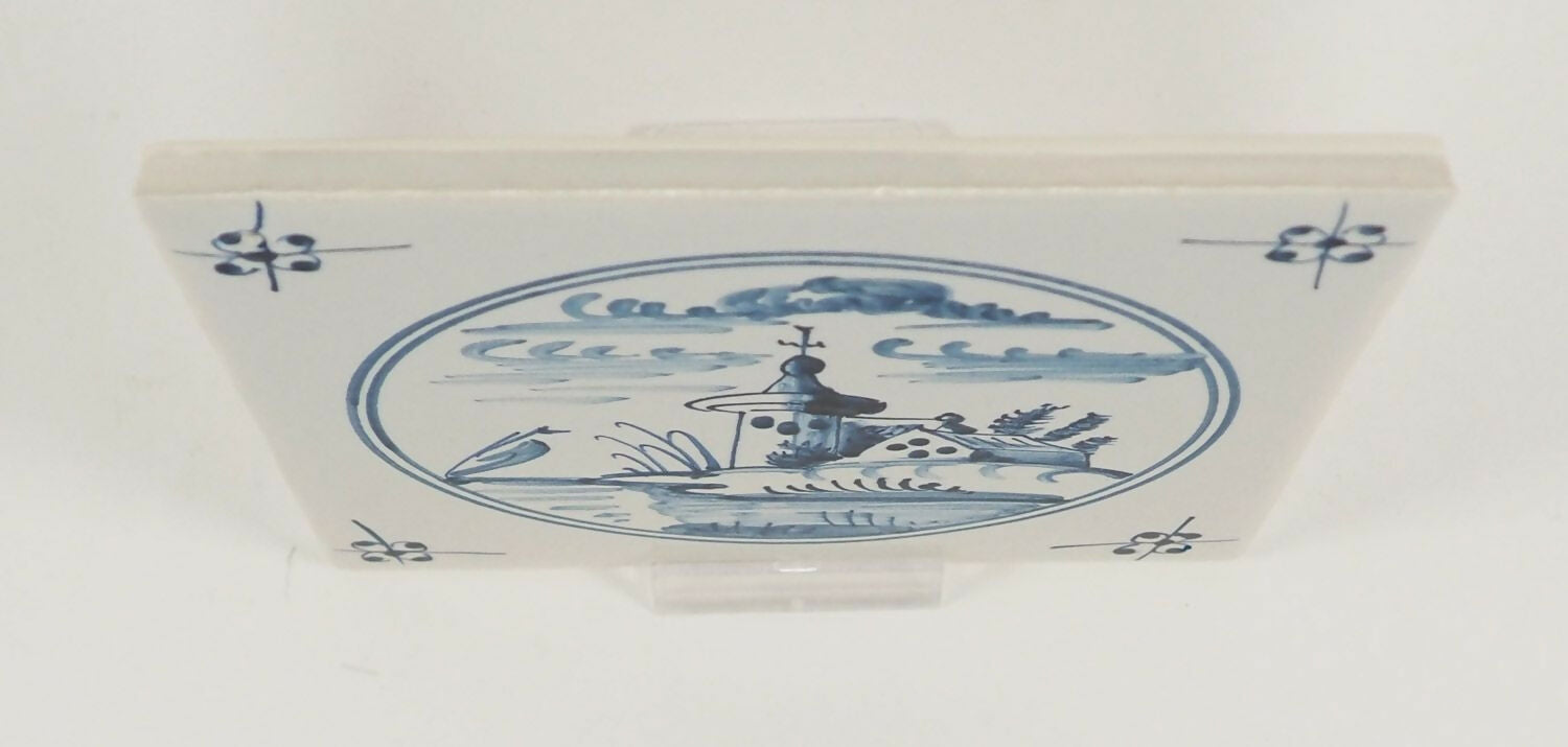 Rectangular ceramic plate with blue floral and landscape design on a white background,  available  to buy on the-salon.com. SALON curates the finest , unique, handmade pieces from the interior industry's best makers and brands. Shop luxury furniture, lighting, rugs, art, antiques and vintage pieces and accessories from SALON interior designed rooms.