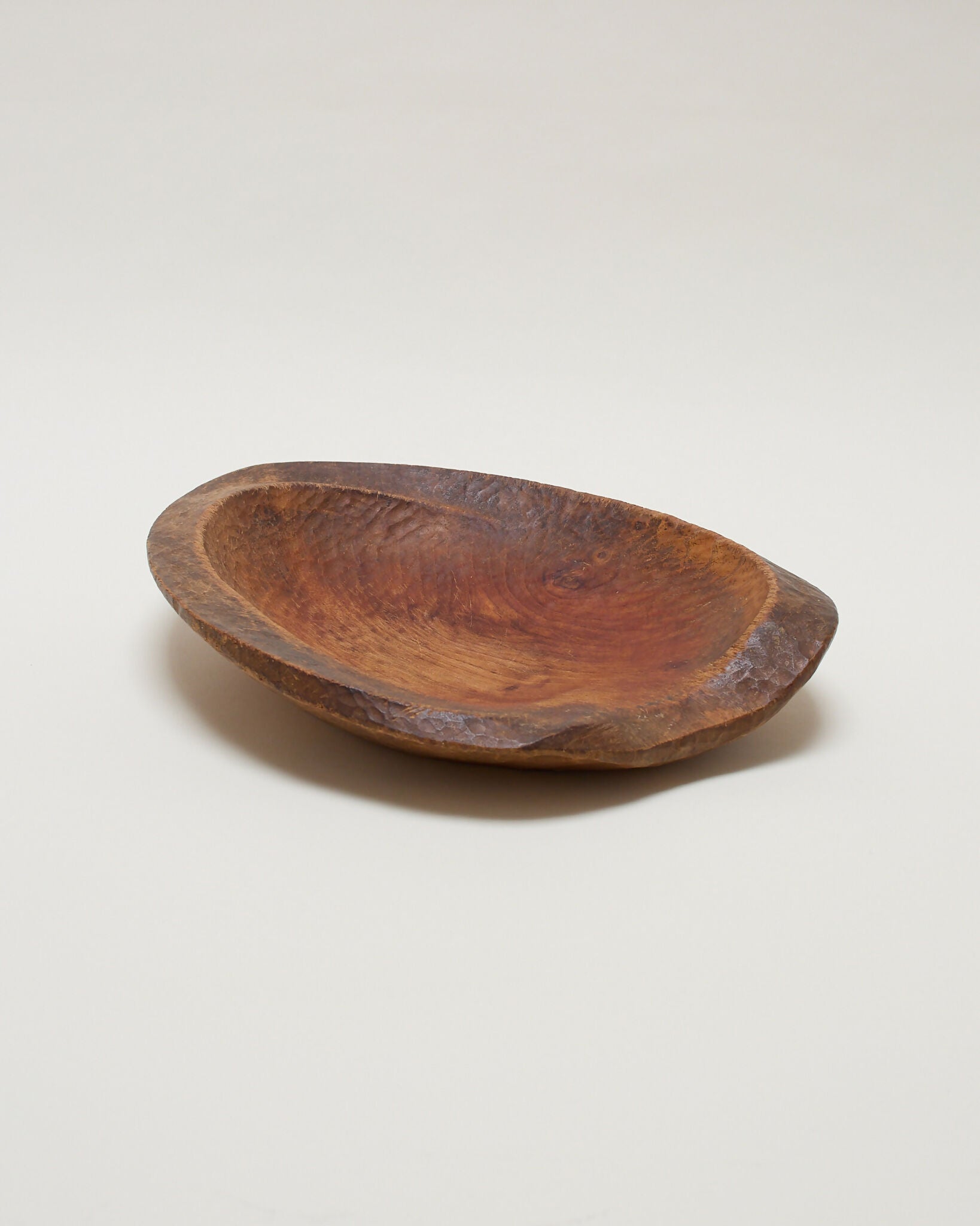 Wooden bowl on a plain background,  available  to buy on the-salon.com. SALON curates the finest , unique, handmade pieces from the interior industry's best makers and brands. Shop luxury furniture, lighting, rugs, art, antiques and vintage pieces and accessories from SALON interior designed rooms.